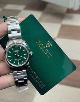 Brand New 31mm Pastel Green Rolex Osyterperpetual Comes with Box & Papers