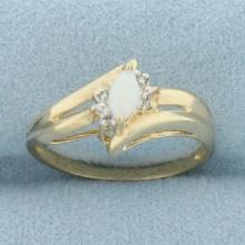 Opal And Diamond Ring In 10k Yellow Gold