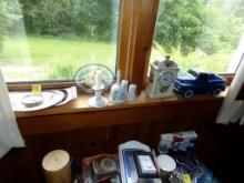 Items on Window Sill, Porcelain Bells, Clock, Blue Pottery Truck and Silver