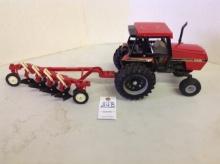 1985 Case IH 2594 Collector Series tractor & IH 4 bottom plow