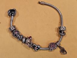 Pandora Sterling Silver bracelet with charms