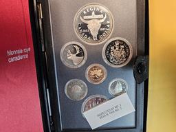 Three Canadian Coin sets in original packaging