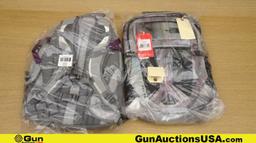 The North Face Recon Backpacks. Excellent. Lot of 2; 1-Grey/Purple, 1- Low Key Tie Dye.. (54461)