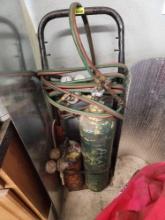 oxygen and acetylene bottle with rack, hoses, gauges, and torch