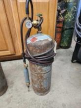 acetylene bottle with hose and torch