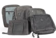Four small zippered nylon bags.