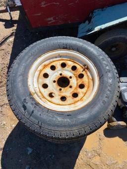 4 OF 205/76/D15 TRAILER TIRES ON RIMS