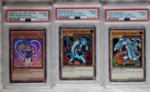 3 Graded Yu-Gi-Oh! Cards - 2 Var. Blue Eyes White Dragon LCKC-EN001 & Dark Magician GIrl MVP1-ENS56