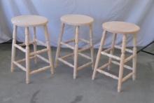 Three unfinished stools