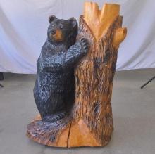 Black bear and tree chainsaw carving