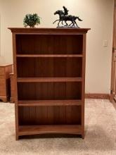 Dressy cherry bookcase; adjustable shelves; shiplap back