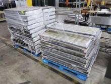 pallets of fluorescent troffer light fixtures