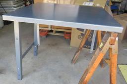 36" x 36" heavy duty steel work tables.  These tables come with legs on one side and are designed to