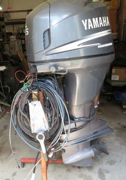 2005  115 hp Yamaha 4 stroke outboard motor with prop, controls, wire harness, and steel stand,  ...