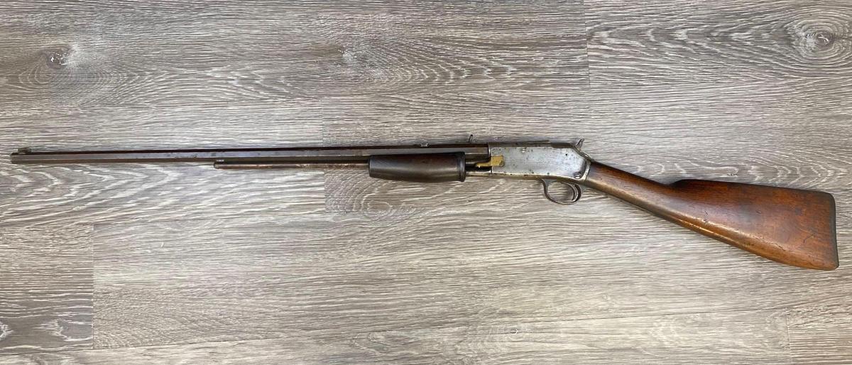 COLT LIGHTNING SLIDE ACTION RIFLE .22 CALIBER, LAST PAT'D DATE ON BARREL FEB. 22, 1887.