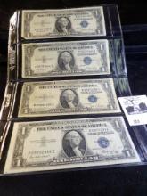 Series 1935D & (3) 1935E One Dollar Silver Certificates in a plastic page.