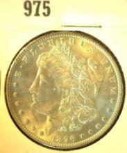 1896 P Morgan Silver Dollar with Natural toning. Brilliant Uncirculated.