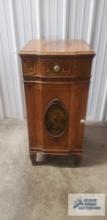 Antique Victorian four drawer stand with door. 36 in. tall by 17 in. wide by 19 in. deep
