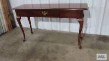 Cherry sofa table made by Thomasville. 28-1/2 in. tall by 52 in. long by 16 in. deep