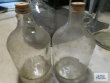 Two small glass carboys