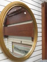 Oval Gilt Framed Beveled Mirror