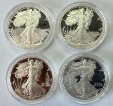 Lot of 4 proof U.S. American Eagle silver dollars in their original capsules from the U.S. Mint