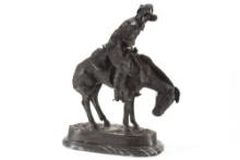 Bronze Sculpture titled "The Norther" marked "Frederick Remington", measures 23" T x 16" oval base.