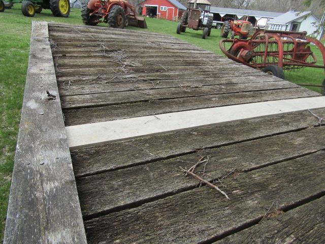 146. 4 WHEEL WAGON WITH OLDER 8 FT. X 16 FT. WOODEN FLAT RACK