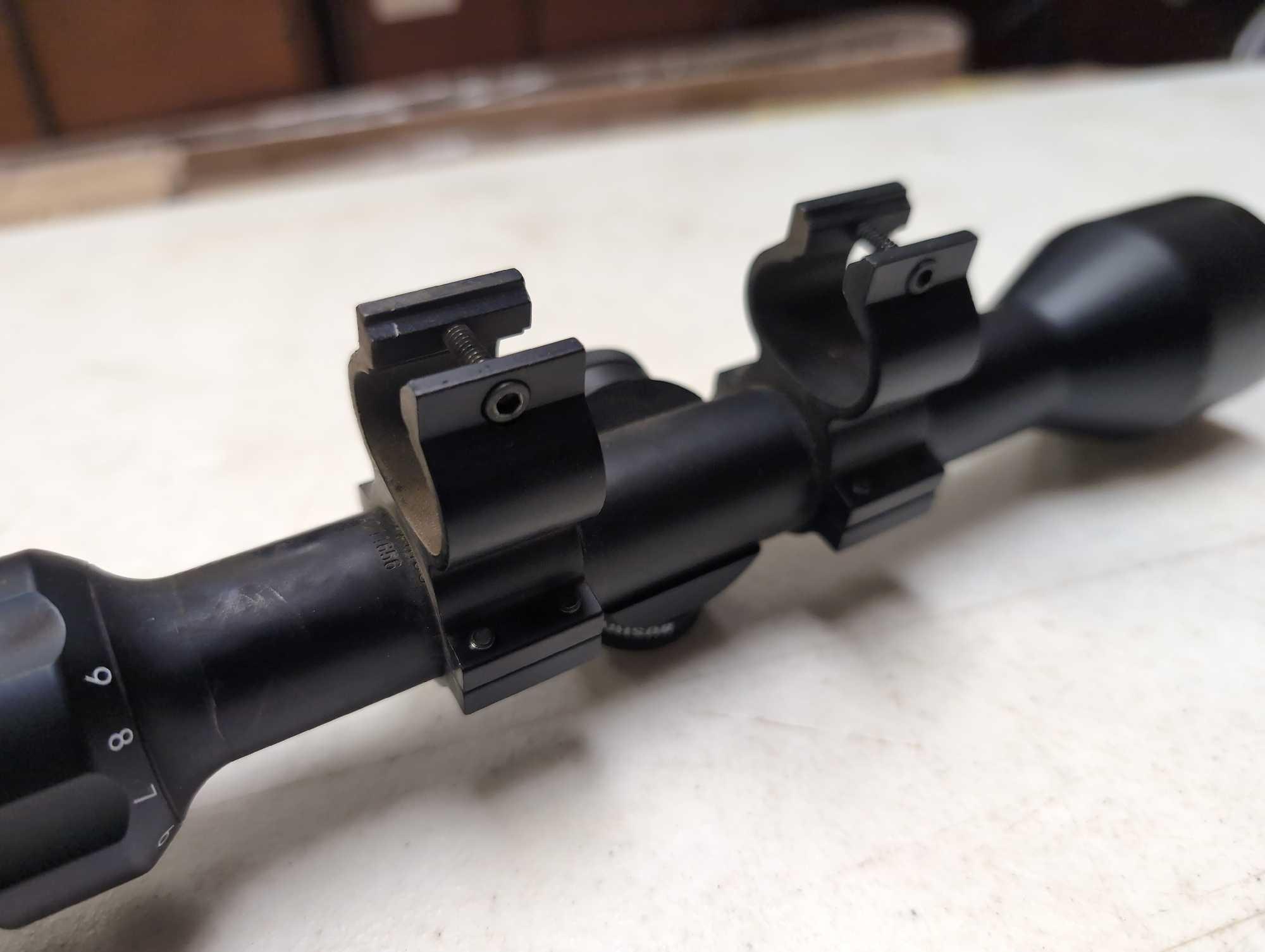 BUSHNELL 3-9X40 RIFLE SCOPE WITH MOUNTING BRACKETS - MODEL #73-3948, SERIAL #AO11656. COMES WITH