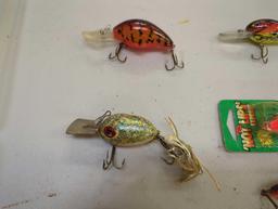 Tackle Box and contents including various fishing lures of similar style. Comes as is shown in