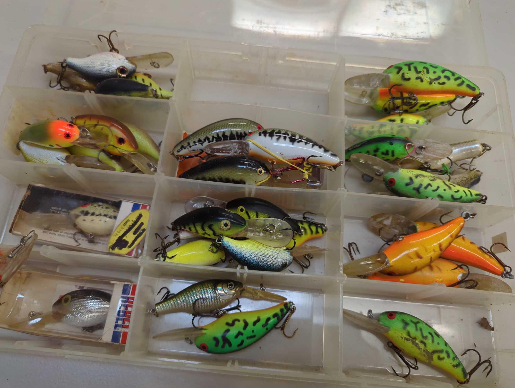 Tackle Box and contents including various fishing lures of similar style. Comes as is shown in