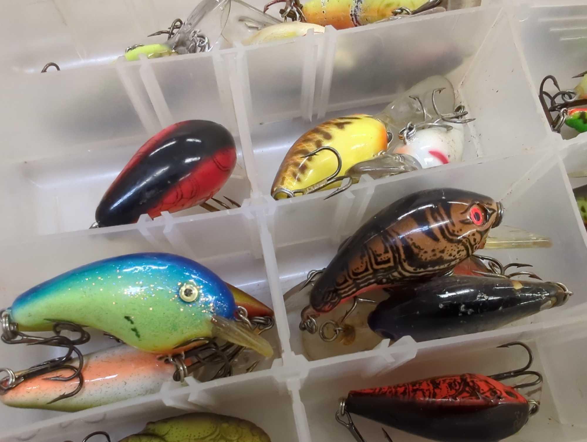 Tackle Box and contents includes fishing lures of similar style. Comes as is shown in photos.