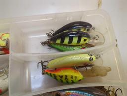 Tackle Box and contents includes fishing lures of similar style. Comes as is shown in photos.