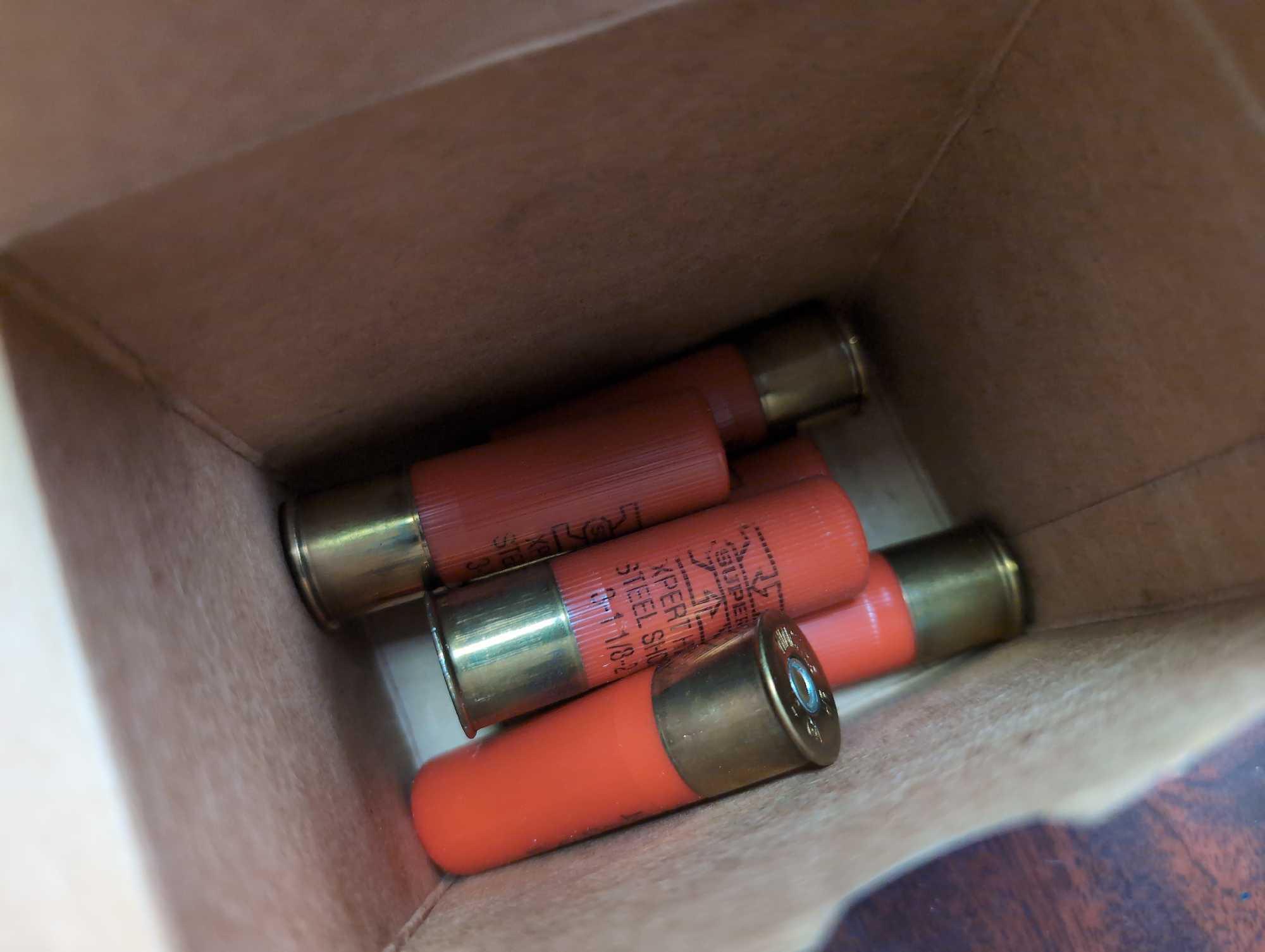 APPROXIMATELY 50 WINCHESTER 12 GAUGE SHOTGUN SHELLS.