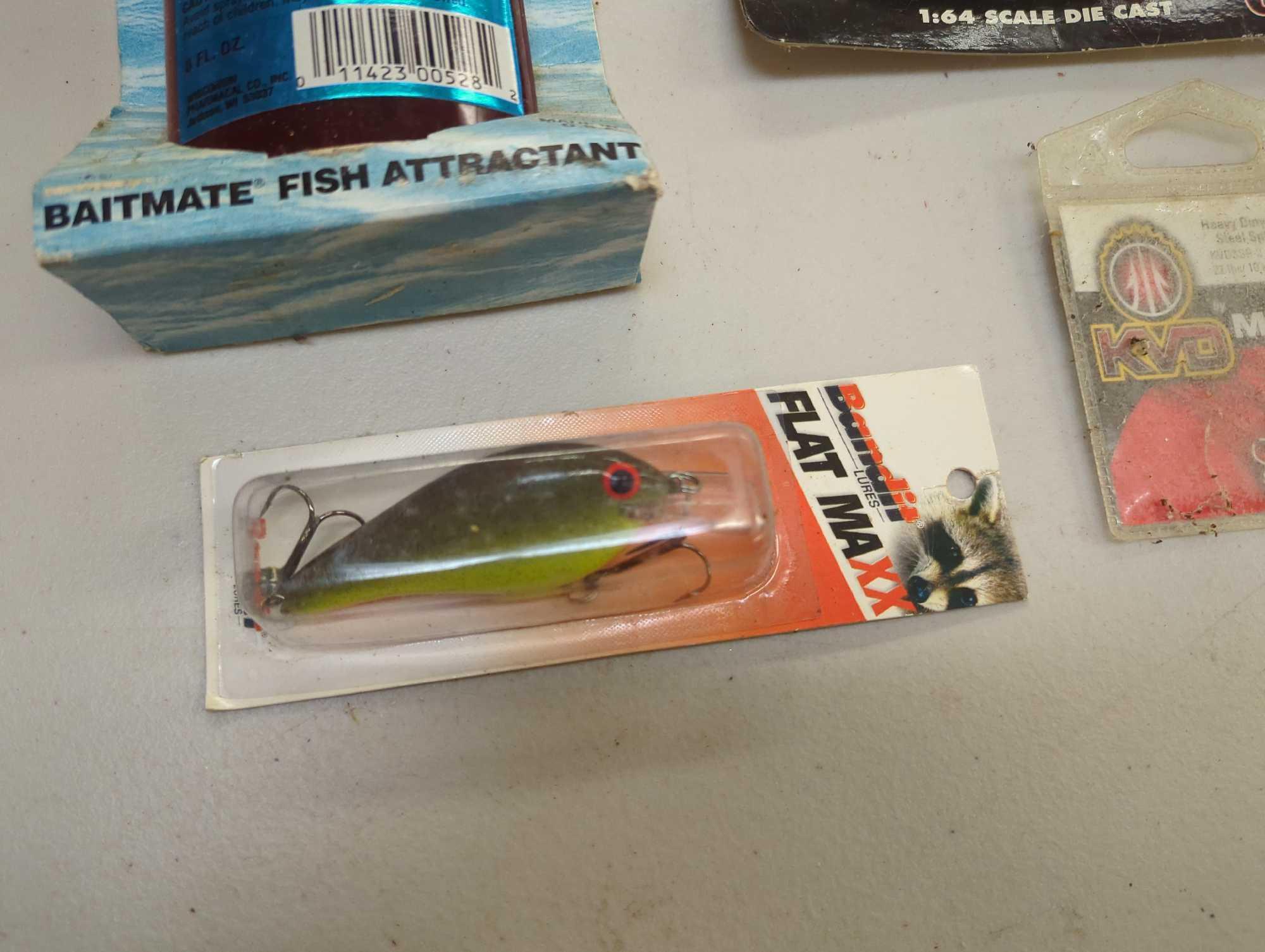 Box of various fishing lures and other fishing accessories. Comes as is shown in photos. Appears to