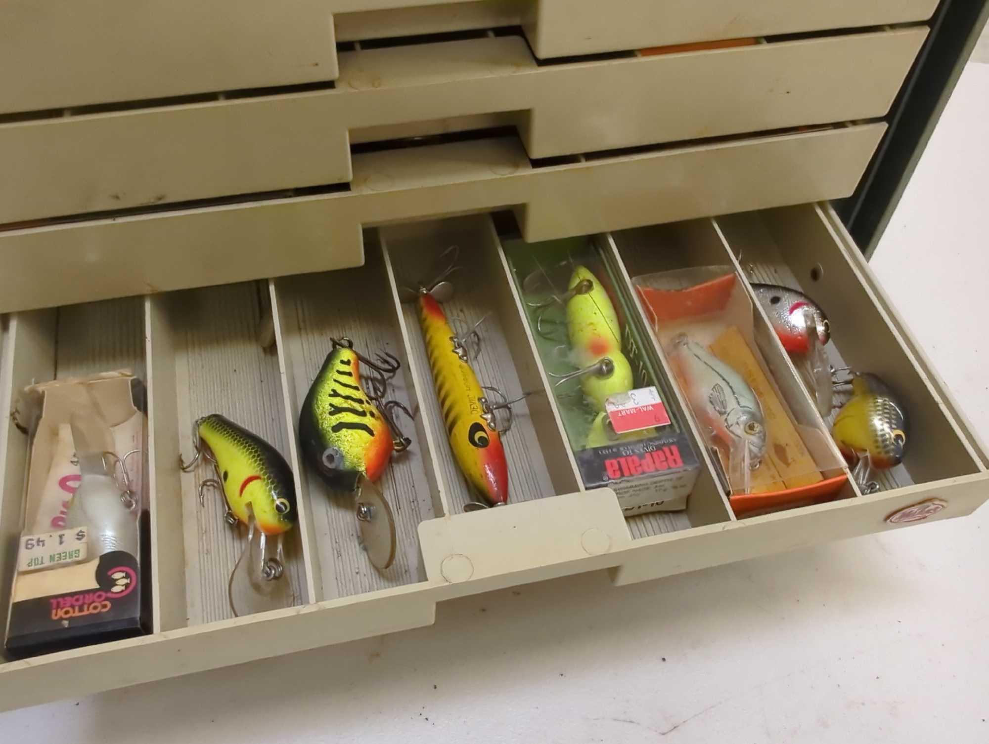 Tackle Box and contents including fishing worm lures and other various fishing lures. Comes as is