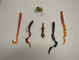 Tackle Box and contents includes various styles of worms and other fishing lures. Comes as is shown