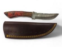 Handmade Damascus steel knives with custom wood, bone, horn or resin handles. The knives are made