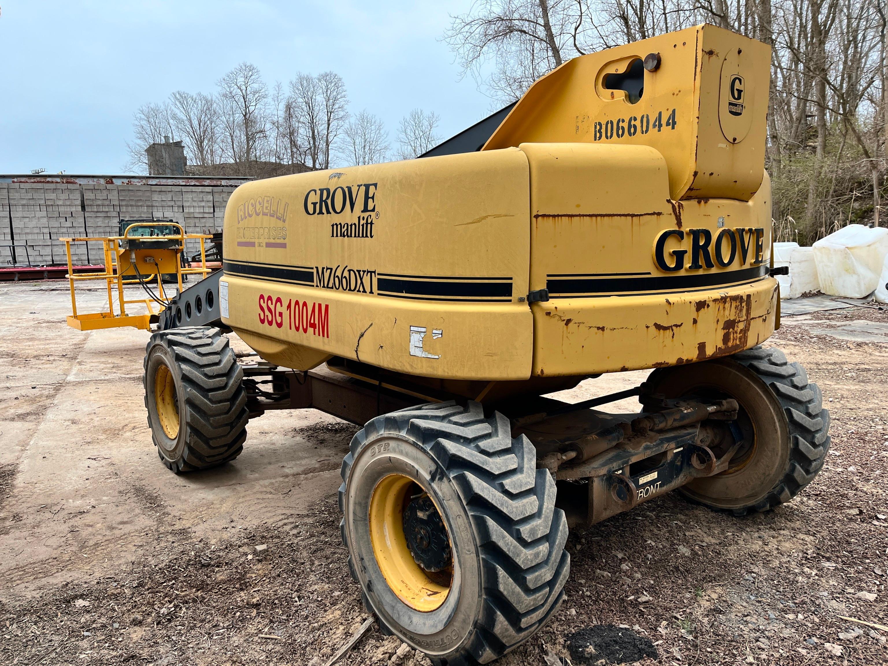 GROVE MZ66DXT BOOM LIFT SN:253158 4x4, powered by 4 cylinder dual fuel engine, equipped with 66ft.