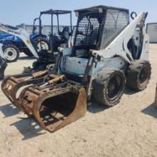 BOBCAT 873 SKID STEER powered by diesel engine, equipped with rollcage, auxiliary hydraulics,