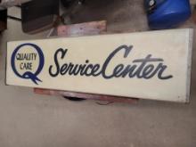 Quality Care Service Center Sign