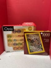 1000 piece puzzle poster, size unopened and OTRIO game
