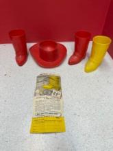 1960s plastic cowboy hat, boots child?s dinnerware set with with the original paperwork