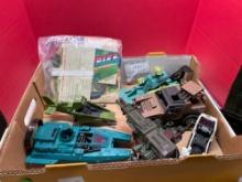Vintage 1980s G I Joe action figure pieces and vehicles