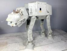 A Star Wars AT-AT Walker With Han Solo and Chewbacca Figurines