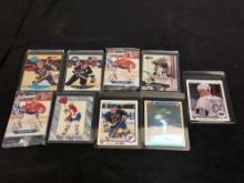 Assortment of 8 Hockey Cards - Wayne Gretzky, Patrick Roy, Brett Hull, & Others