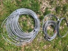 300+ ft of 3/8" zip line cable with anchor cables. Includes 5 Petzl cable trolleys with 4 carabiner