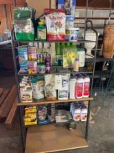 Shelf of Plant Food, Insect Control, Mole Repellent, Row Markers