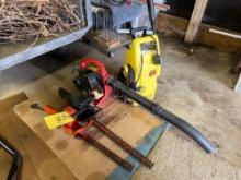 Electric pressure washer with blower and hedge trimmers