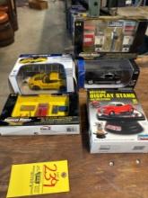 assorted toy cars and accessories